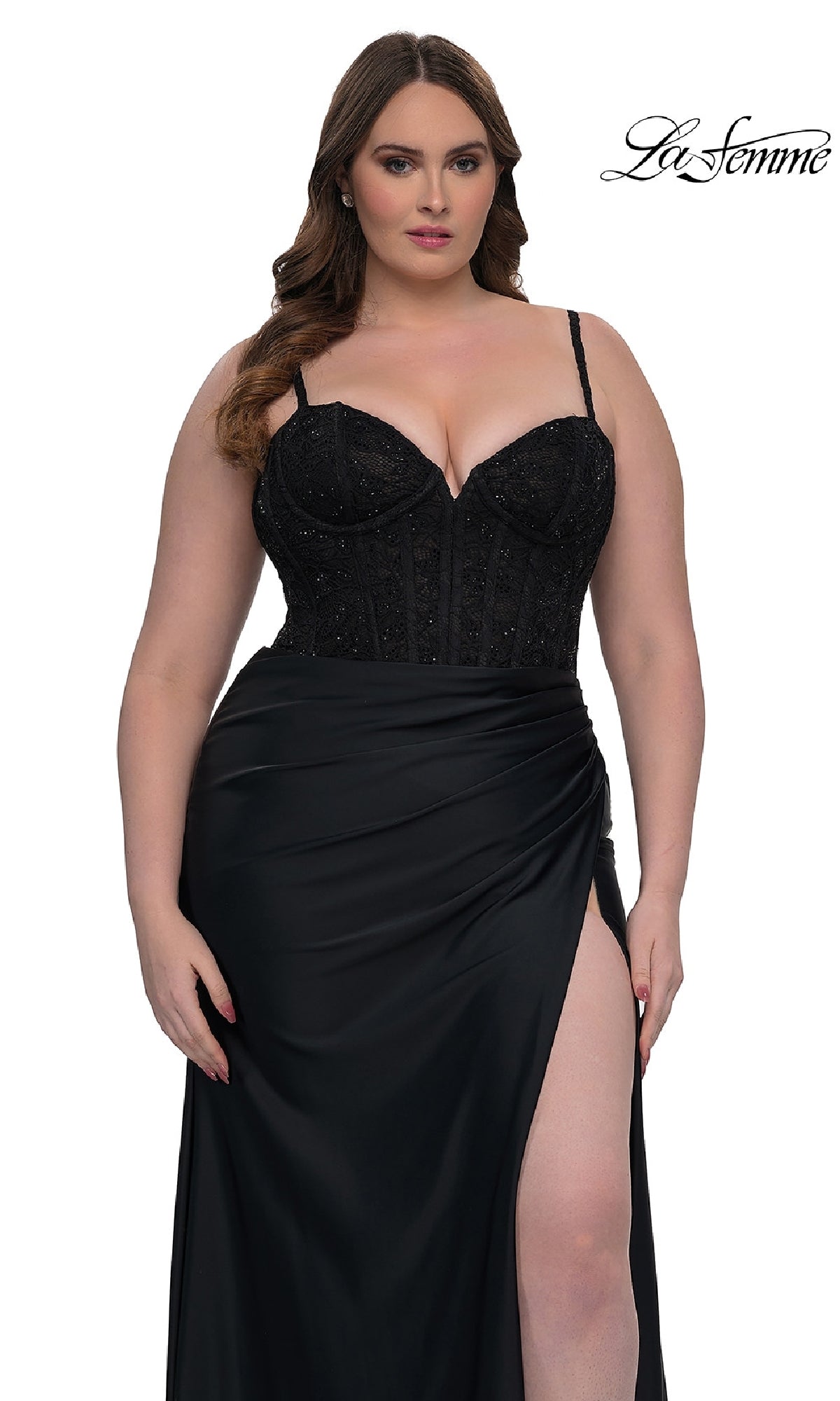 A woman wears the Plus-Size Long Corset Prom Dress: La Femme 32449—a black, sleeveless beaded gown with a thigh-high slit—against a white background. The La Femme logo appears in the top right corner.